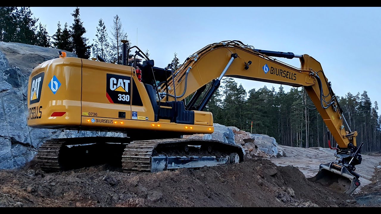 Cat 330 next generation doing drainage ditch & refill