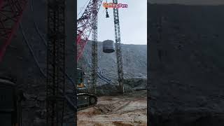 Dynamic Compaction Machine Dropping Heavy Hammer on Site