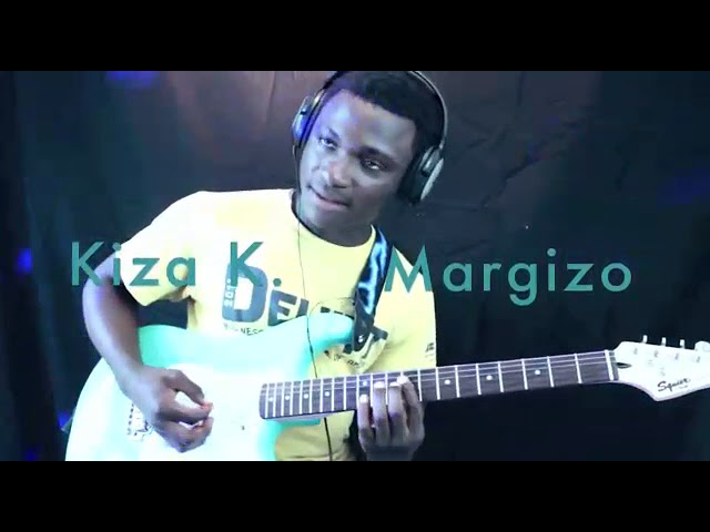 KIZA E. MARGIZO / Maria Babembe babondo class=