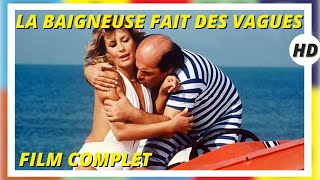 La baigneuse fait des vagues