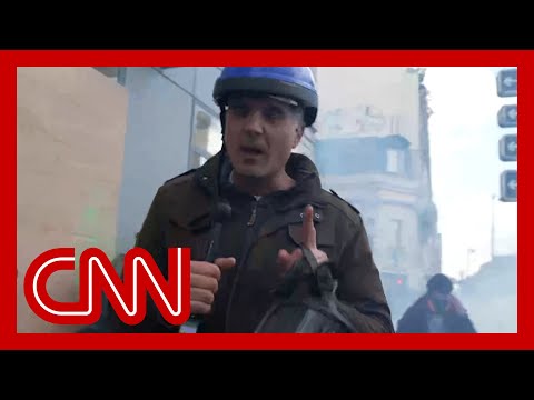 'catch your breath': cnn reporter gets caught amid tear gas during paris protests