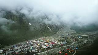 Kedarnath, India: Hindu Temple and pilgrimage aerial shot in clouds | Stock Video