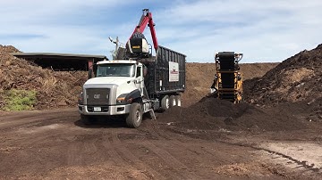 Loading organic compost
