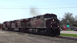 CP 261 with three mid train DPUs NB empty grain with KCS power April 24, 2022