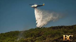 Two dead and hundreds evacuated after twin fires break out on Greek island