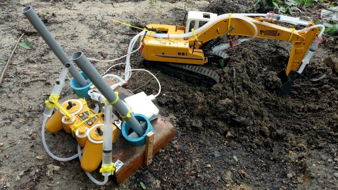 DIYคันโยกไซริงค์บังคับรถแบคโฮ^^แรงตามมือ^^diy excavator hydraulic