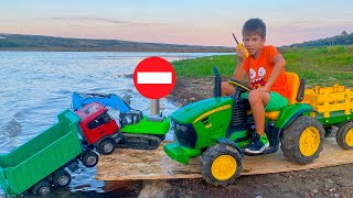 Darius rides on tractor and plays Watermelon delivery | Tractor is stuck in the mud