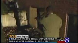 Car hits building, two injured