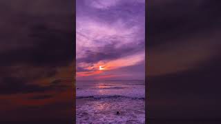 Person at Beach Witnesses Stunning Sunset With Purple Sky and Waves - 1497608