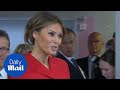 Multilingual Melania speaks French to children in Paris hospital - Daily Mail