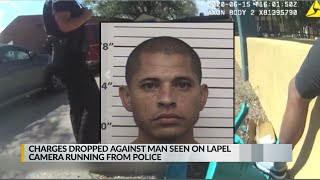 Charges dropped for man seen on video running from police