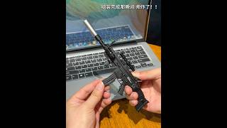 What guy could say no to a mini model toy gun you assemble yourself? It looks absolutely awesome!