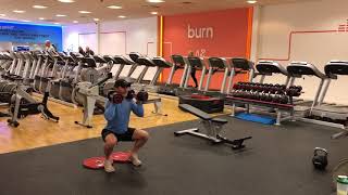 Heels elevated dumbbell front squats