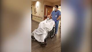 Healthcare workers cheer first coronavirus critical care recovery at Grand Rapids hospital
