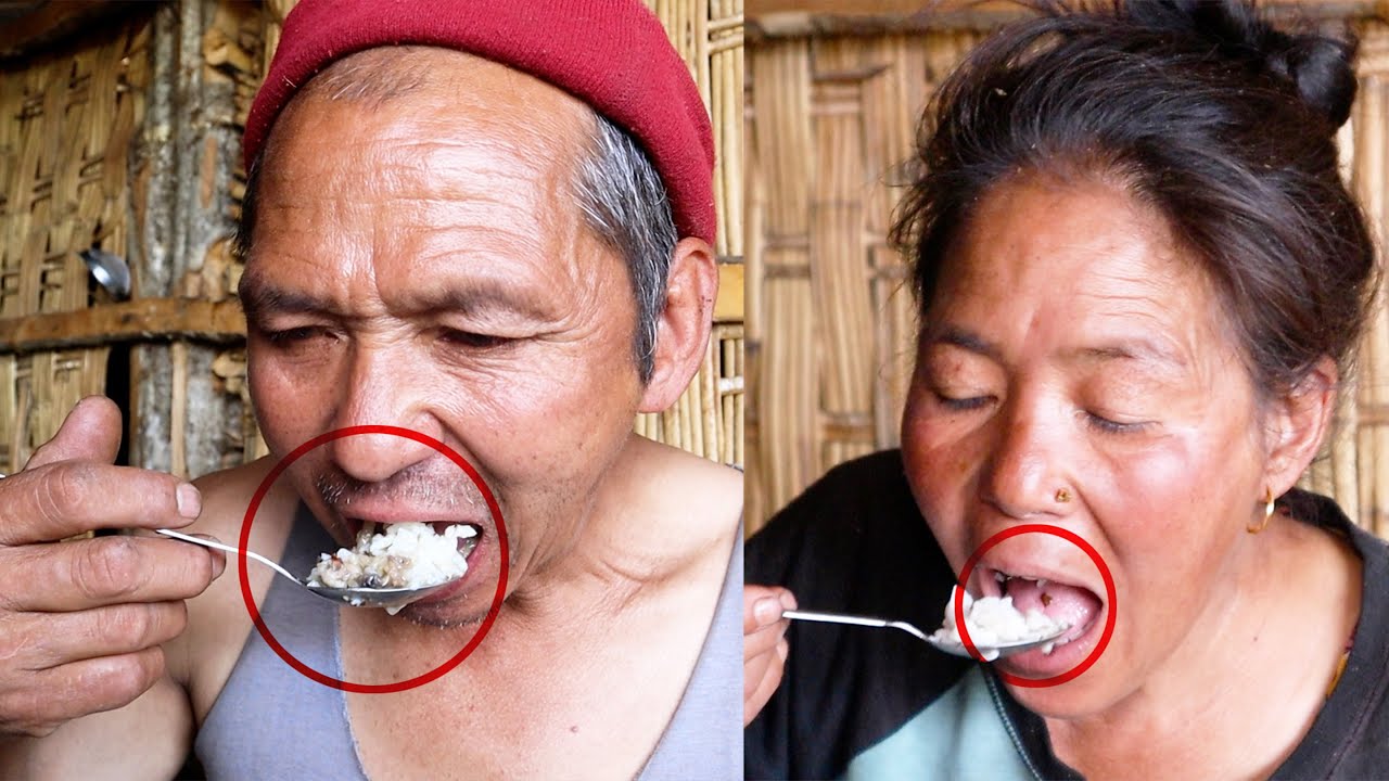 jungle man , his wife & daughter are having lunch 