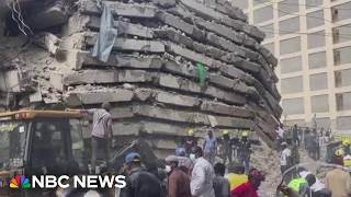 Search for survivors after high-rise collapse