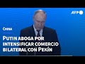 Putin aboga por intensificar comercio bilateral en el cierre de su visita a China | AFP