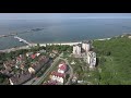 Аэро обзор города Пионерский в Калининградской области, пляж, променад, порт, набережная, терминал.