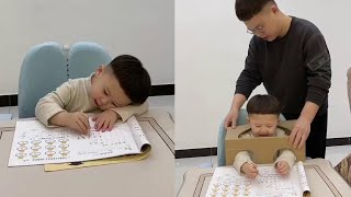 Dad Used Cardboard to Correct His Son's Sitting Posture.