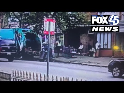 'They crushed them!' | Surveillance video shows a city garbage truck destroying community trash cans