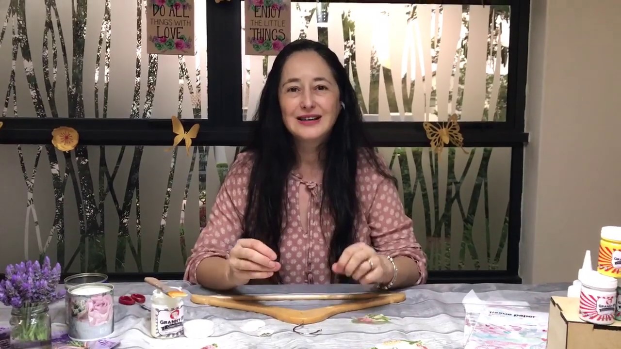 Decoupage a coat hanger