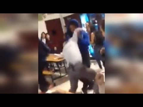 watch-high-school-student-body-slam-principal-during-cafeteria-fight