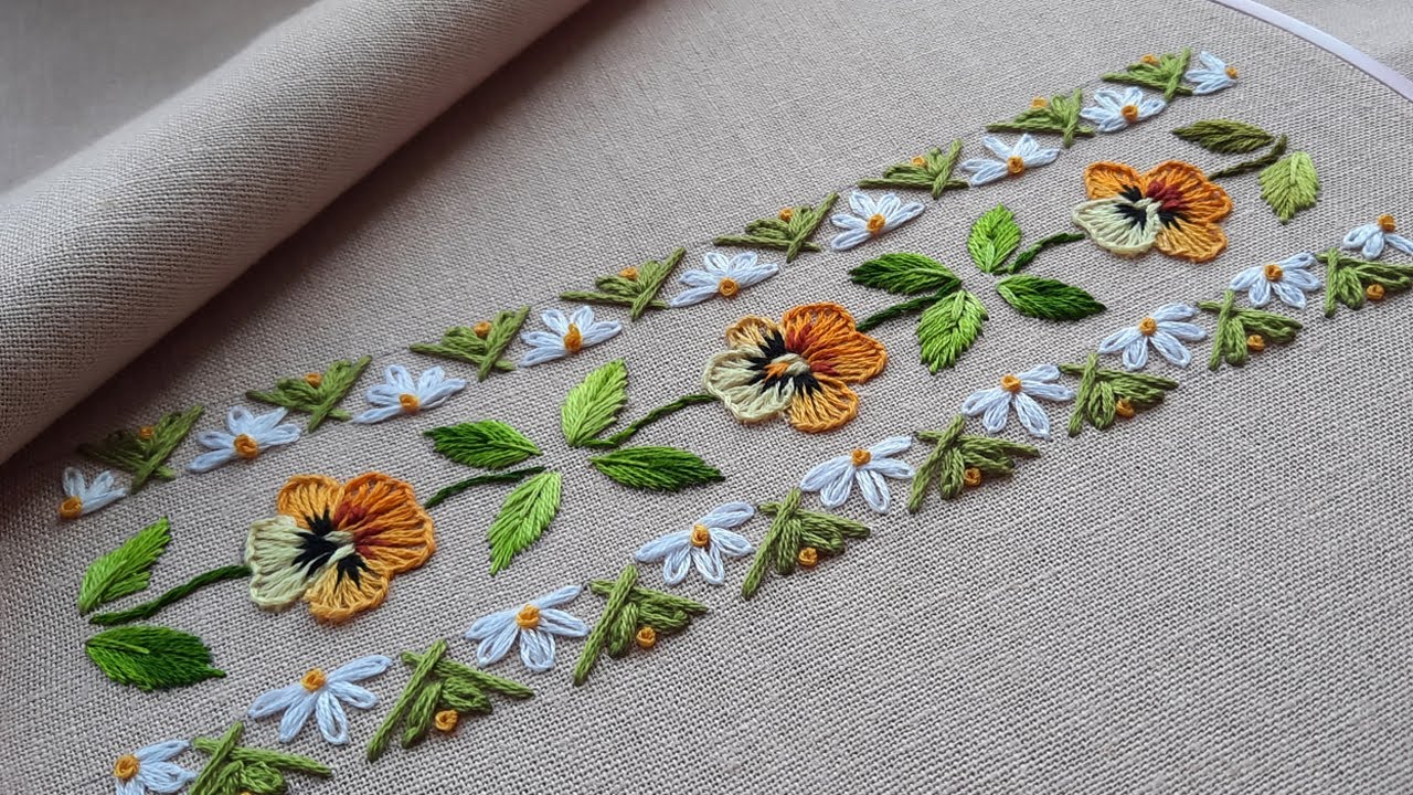 Flower border design Pansies and daisies Floral embroidery