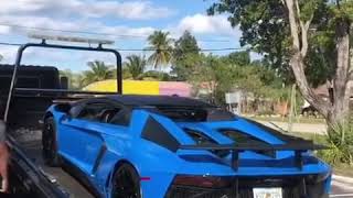 Lamborghini Aventador SV Roadster Getting Lifted On A Truck | Supercars