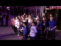 Dragon Scales Vocal Group sings the National Anthem