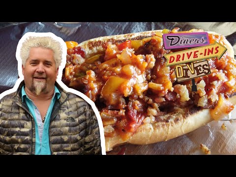 Guy Fieri Recreates a Bacon-Wrapped Fried Hot Dog | Diners, Drive-ins and Dives | Food Network