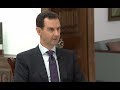 Bashar al-Assad warns US troops to leave Syria as he raises prospect of clash