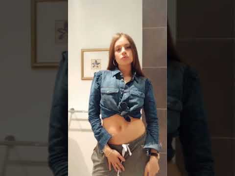 Xenia Tchoumi showing why she is the belly button navel queen.