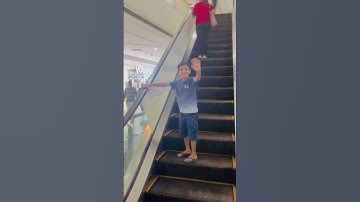Never forgot to hold handrail when you go  on #escalator first time #shorts#youtubeshorts #ytshorts