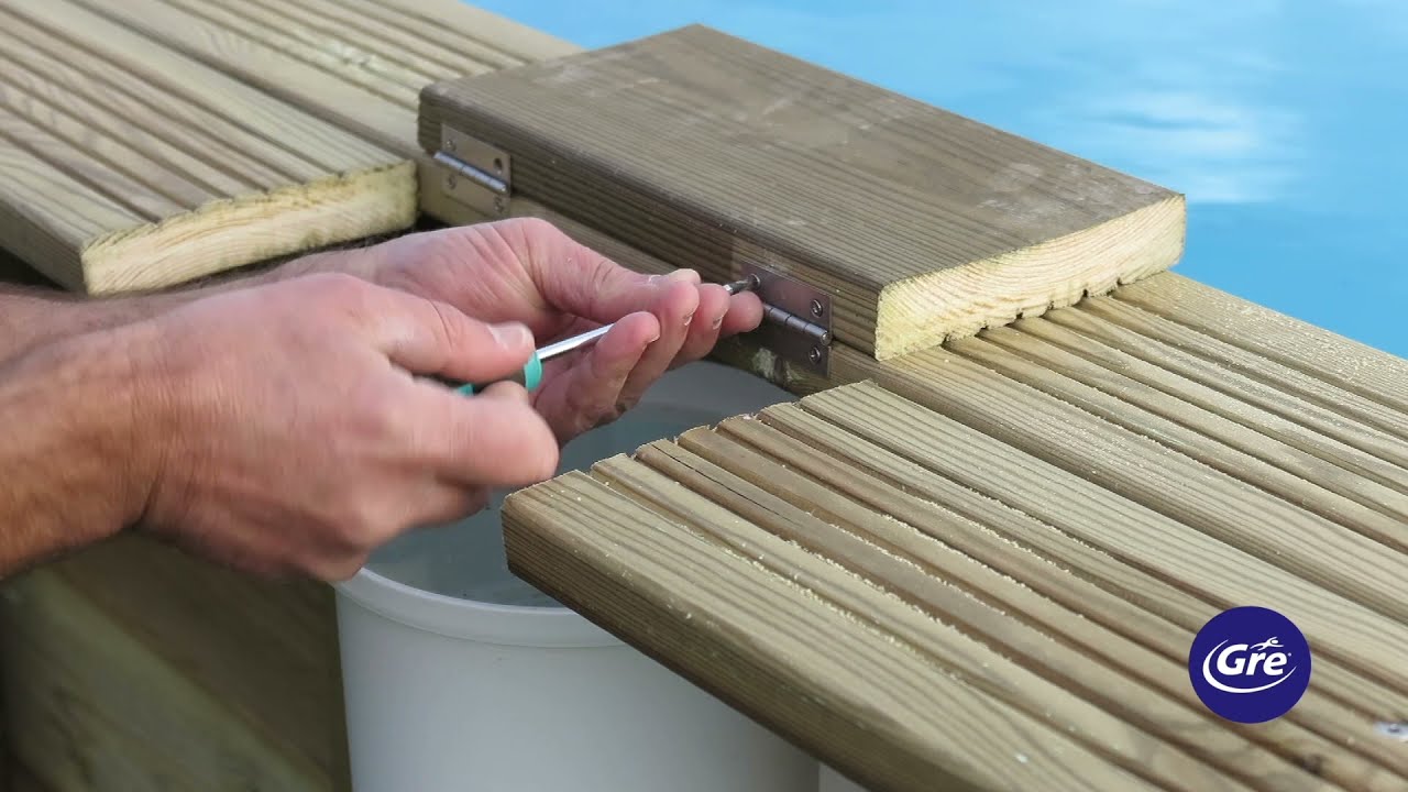 Montaje de una piscina de madera redonda Gre