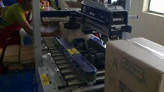 147 138 Semi Automatic Online Machine (Tapping & Strapping) | Ascent Packaging Systems
