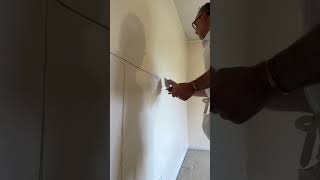 Filling joint in plasterboard use a sharp flat plate applying pressure #plaster #construction