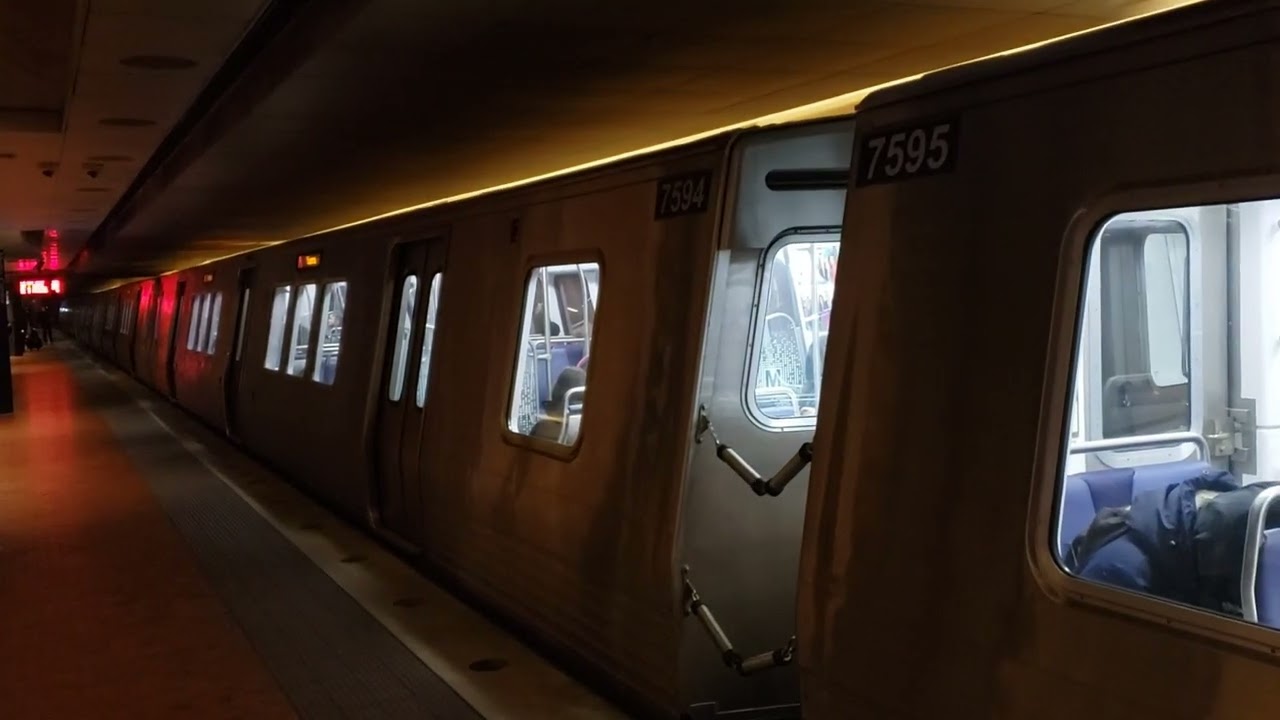 Blue and Orange Line trains at Metro Center lower level