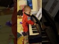 Caleb playing the keyboard