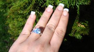 M4H01945 cross over ring shown with a 2.00+ center