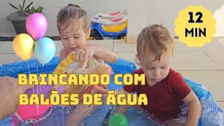 BRINCANDO DE ESTOURAR BALÕES DE ÁGUA