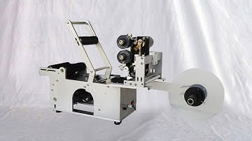 Round bottles labeling MC with coding test for Germany customers Etikettiermaschine halbautomatisch