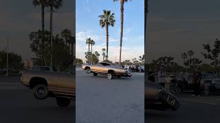 1968 Chevy Impala Lowrider tippin’ in 3 wheel motion to bend the corner at a classic car show!