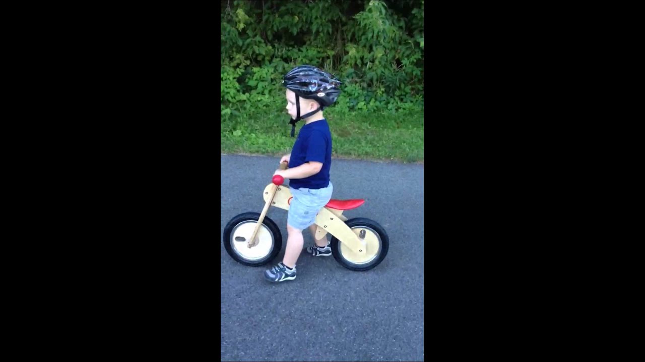 7/26/13 Logan riding his skuut