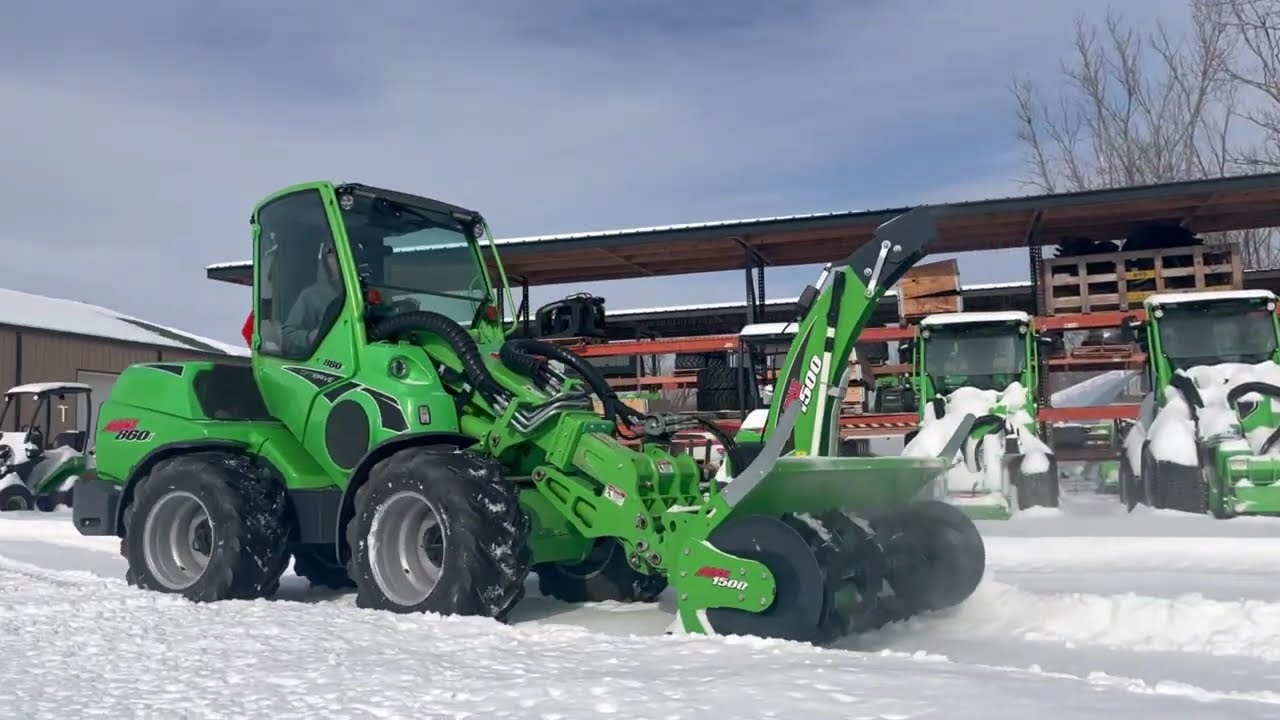 Blowing  snow with the AVANT 57hp 860i and 1500 snow blower!!