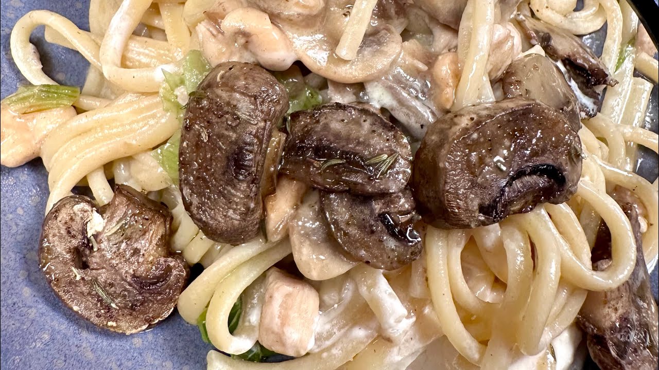 Creamy pasta with mushrooms and chicken breast