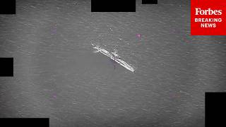Pentagon Releases Footage Of 'Multiple Spherical UAP Near Sub' Seen 'In And Out Of Water'