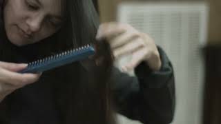 2.5 Mins Young Woman Brushes Her Hair Black Magic Production Camera 4K screenshot 5