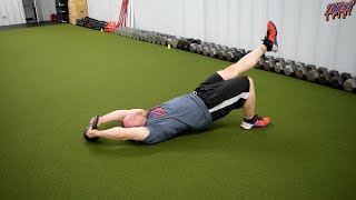 Single Leg Glute Bridge With KB Pullover - THIRSTgym.com