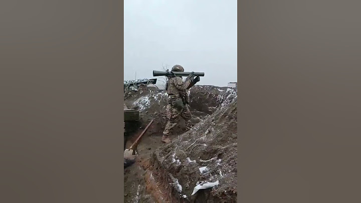 Ukrainian Soldier Fires RPG-7 at Enemy Position