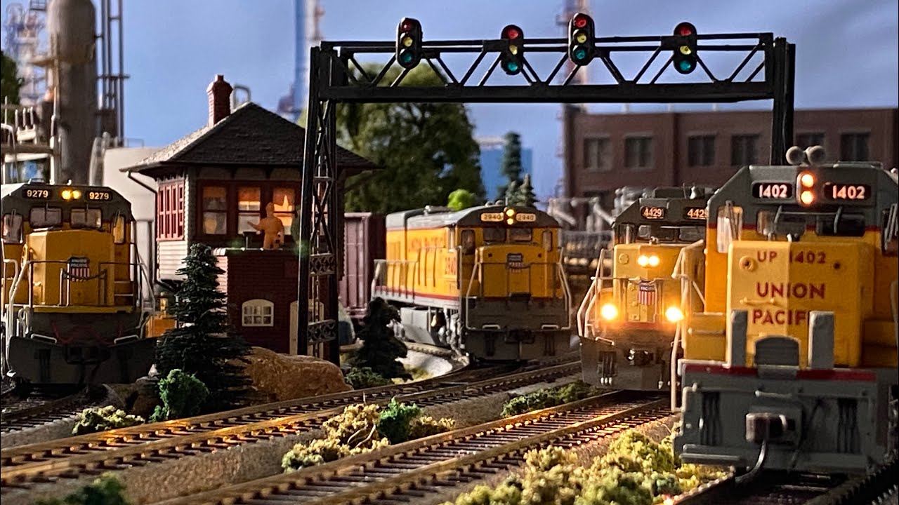 Multi-Train Operations: 4 Union Pacific Freight Trains Running North on ...